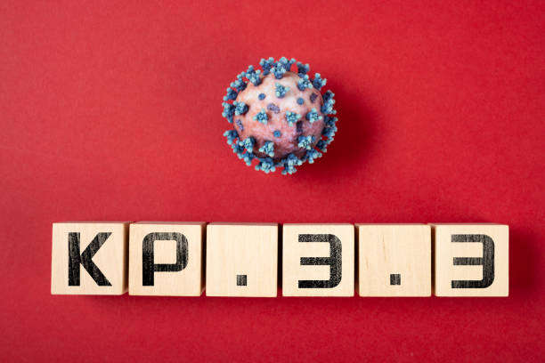 istock coronavirus and variant KP.3.3 variant on a red background 2178517054