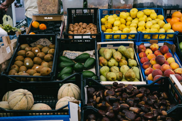 fresh fruit and vegetables in stand at market