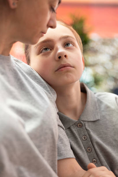 istock Mother and adolescent reconciliating during therapy session 2178517831