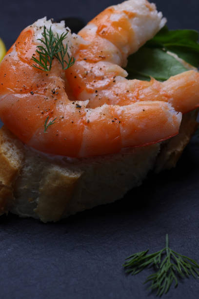 Fresh cooked Prawns or Shrimps on slate platter