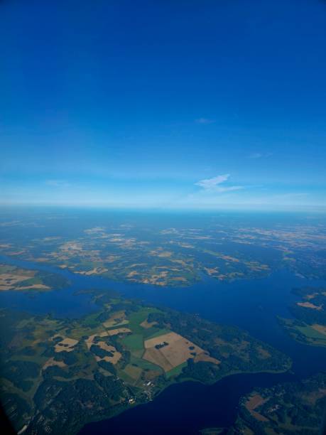 Sweden seen from a passenger aircraft. The image was captured during a journey between Stockholm and Oslo in summer season.