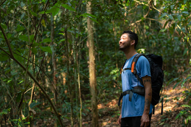 istock Backpacker man in tune and harmony with nature. 2178527064