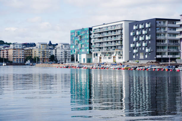 istock View of modern buildings at river 2178527644