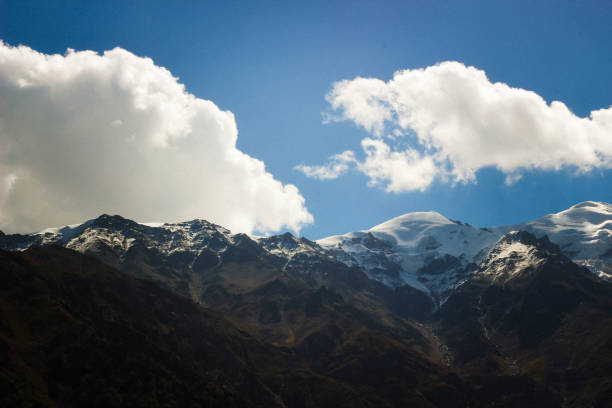 istock Snowy Mountain with blue Sky 2178527966