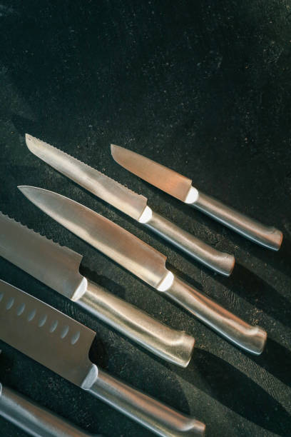 istock Casting steel various chef knife, Set of modern sharp kitchen knives on dark background 2178529343