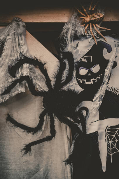 istock Halloween decorations. Spiders and ghosts. Black colored Jack-o-lantern illustration. 2178538188