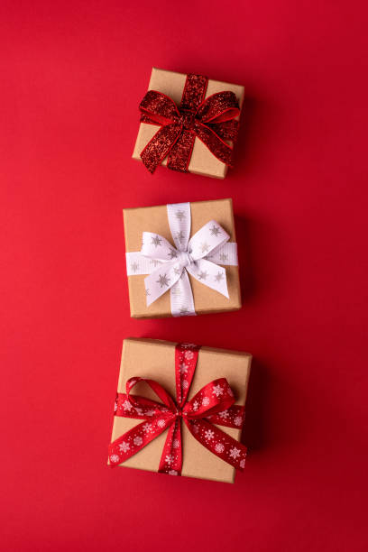 istock Christmas gift boxes with red balls. 2178538223