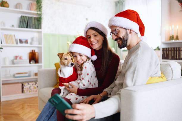 istock Happy family taking selfies during Christmas celebration 2178541198
