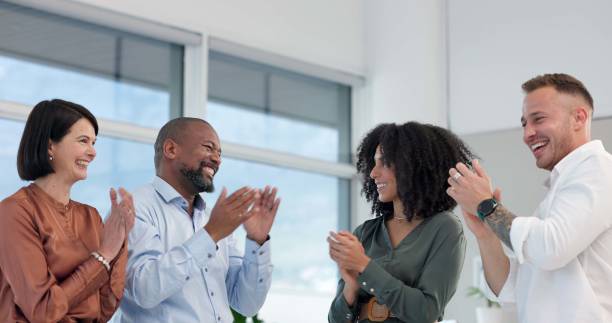 istock Business people, group and applause with celebration in office with support, huddle and connection at company. Team, scrum or circle for synergy, link or solidarity for motivation at creative agency 2178545876