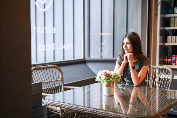 istock Young woman is working at coffee shop. 2178546669