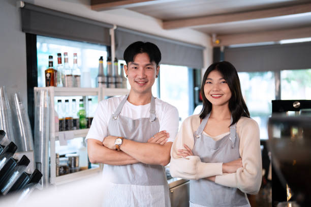 istock Young entrepreneur take care customer at coffee shop. 2178546789