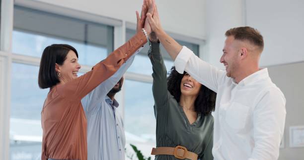 istock Business people, teamwork and high five in office with circle, support and connection at company. Group, scrum and cheers for synergy, link and solidarity with motivation for job at creative agency 2178549303