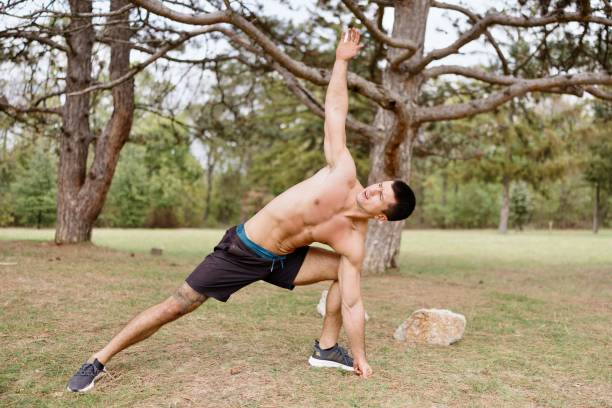 istock Man doing yoga in the nature 2178550038