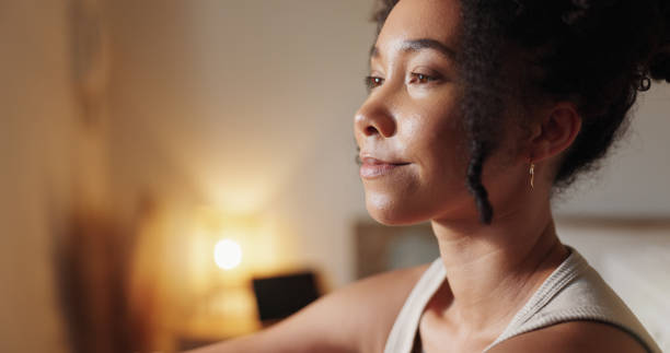 istock Woman, reflection and thinking in home for vision, mindfulness and night with peaceful thoughts. Female person, calm and relax in apartment for perspective, wondering and healthy mind with insight 2178554571