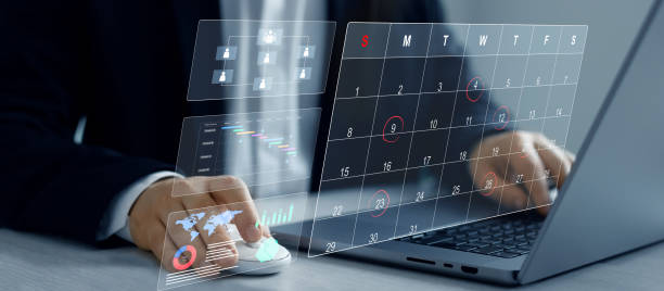 istock Businessman manages time to work efficiently and on time on all projects. Managing a scheduled meeting.Calendar work schedule, business plan concept. 2178557000