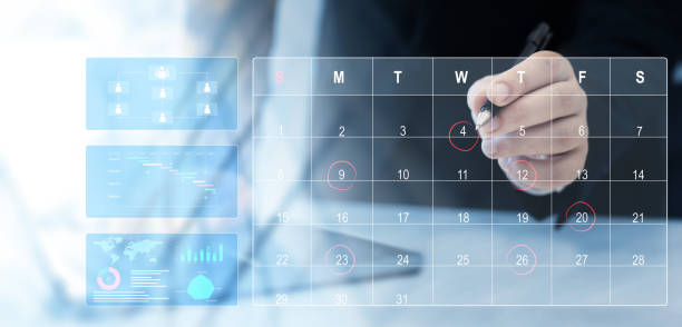 Businessman manages time to work efficiently and on time on all projects. Managing a scheduled meeting.Calendar work schedule, business plan concept.