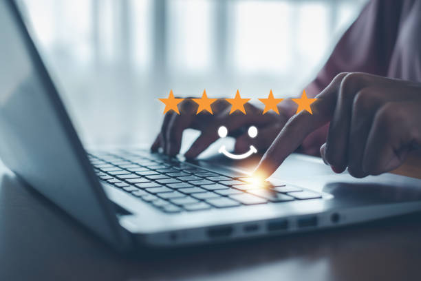 istock Hand with thumb up Positive emotion smiley face icon and five star with copy space.Customer satisfaction concept. 2178558905