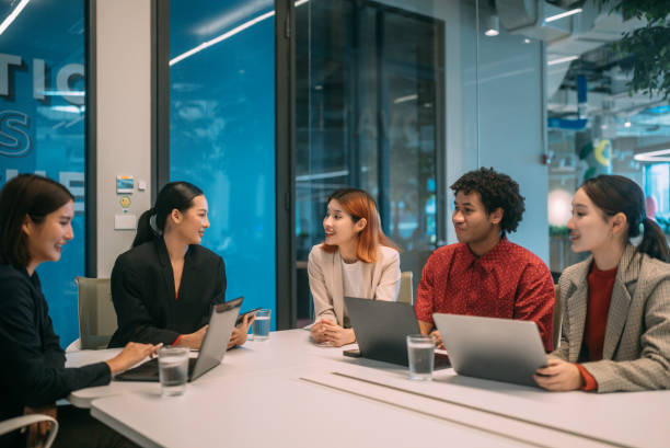 istock A dedicated mentor is explaining mentees importance of project while sitting at the boardroom in corporate firm. 2178559892