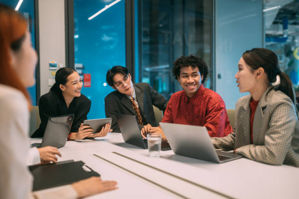 istock A dedicated mentor is explaining mentees importance of project while sitting at the boardroom in corporate firm. 2178560027