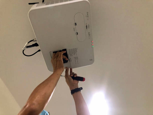 istock Experience hassle-free maintenance with our expert projector installation and repair solutions. 2178561333