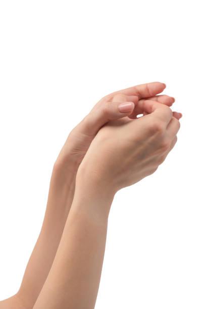 istock Woman hands with nude manicure isolated on a white background. 2178564027