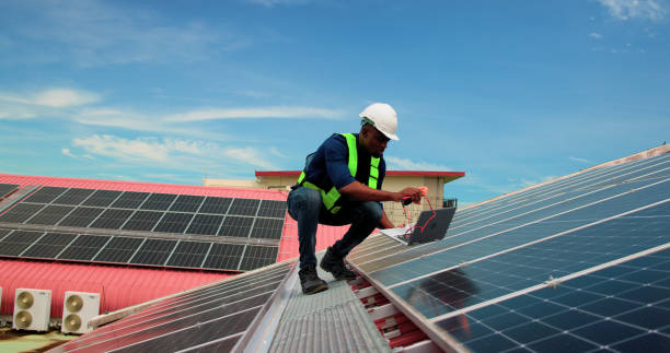 istock The black male Maintenance engineer technicians working plant generate electricity from solar rooftops. 2178570565
