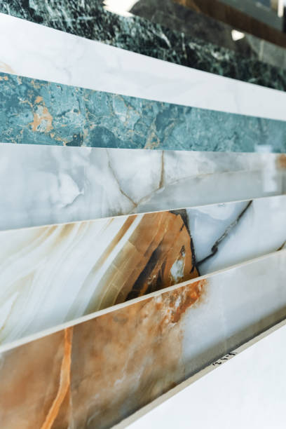 istock A photo displays vibrant marble tiles featuring various patterns. The image highlights key elements like hood, wood, automotive exterior, tints, windshield, vehicle door, bumper, and glass 2178573116
