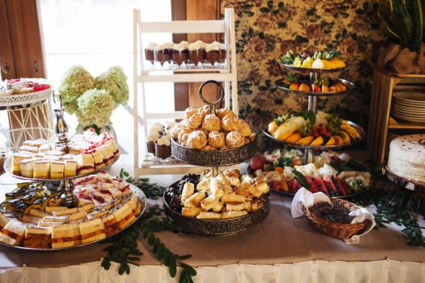 istock Wedding cake table background. Sweet and delicious restaurant desserts. Catering table. Bakery and pastry background. 2178574830