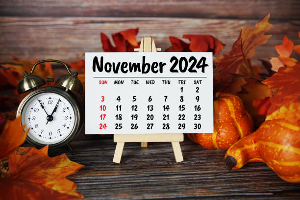 istock November 2024 monthly calendar with maple leaf on wooden background 2178576813