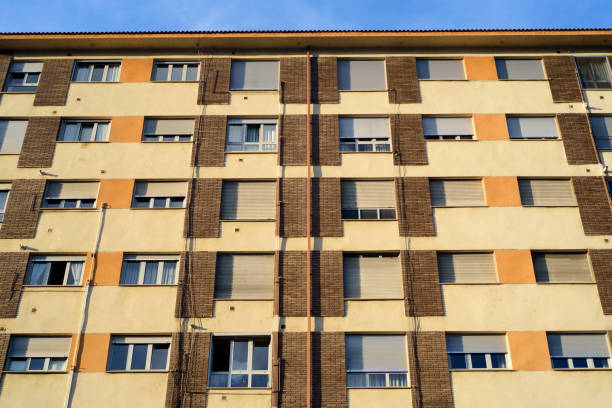 istock Windows in residential building facade from below 2178579860