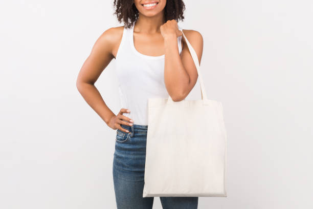 istock Black girl with blank eco sack for mock up 2178584006