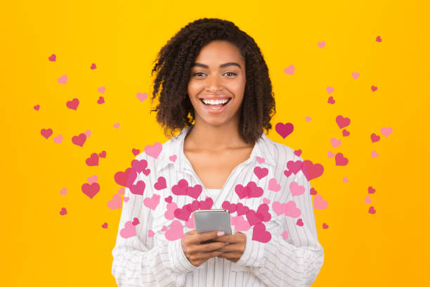 istock Happy afro girl excited about love text messages 2178584057