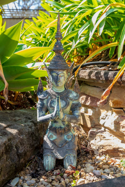 istock A Thai Buddha statue in a garden 2178584640