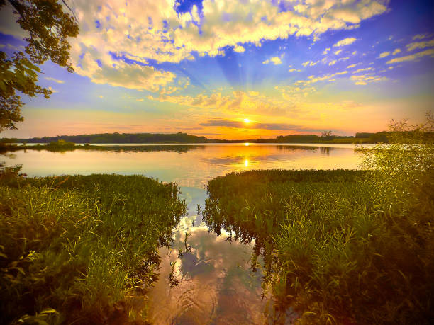 istock Sunset at Pony Express Lake with windmills,  Missouri. 2178585196
