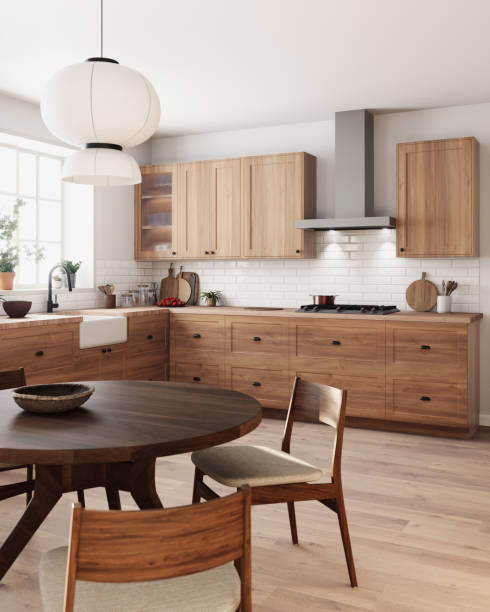 A stylish kitchen designed with beautiful wooden cabinetry, a round table, and a bright and inviting ambiance. 3d render