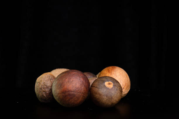 Gold colored basketball balls on black background. Horizontal composition. Basketball championship concept.