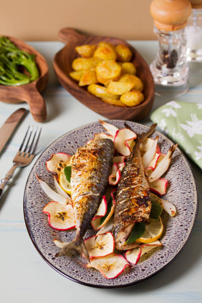 istock Grilled mackerel with apples, onions and bay leaves 2178596032