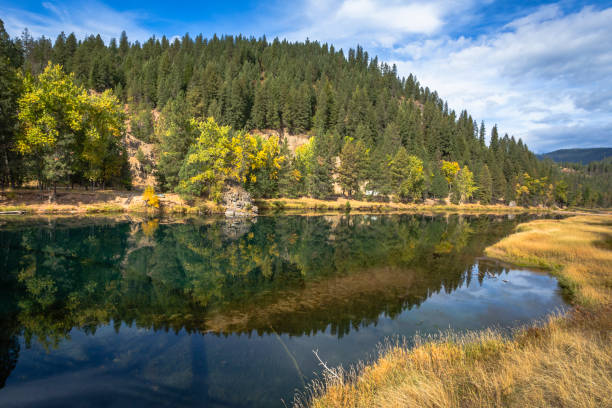 istock Calm water lake reflection in autumn season 2178598040