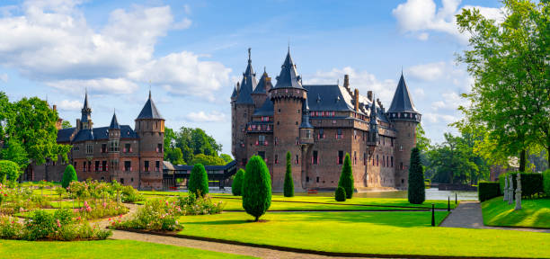 Haarzuilens, Netherlands - July 20, 2022: View of castle De Haar and its ornamental garden near the small village of Haarzuilens in the province of Utrecht, Netherlands