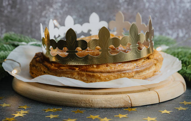 istock One whole fresh royal galette with a crown on a gray background. 2178605234