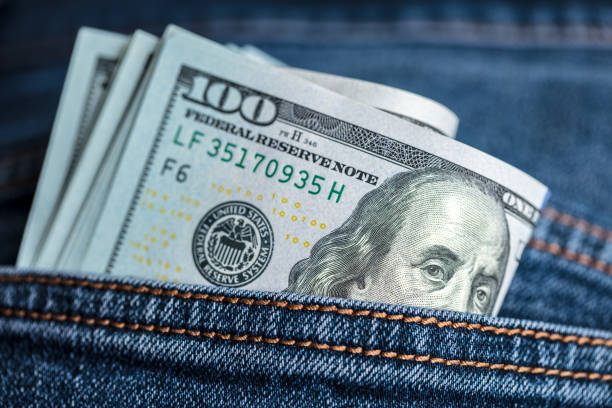 istock Dollar bills in jeans pocket 2178609515