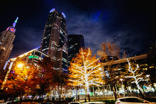 Dallas, Texas, USA - Wide angle view to illuminated street in Dallas downtown.