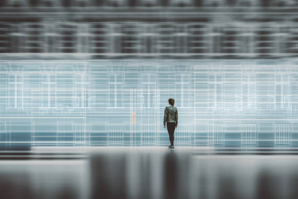 istock Woman standing in glass wireframe VR environment 2178609964