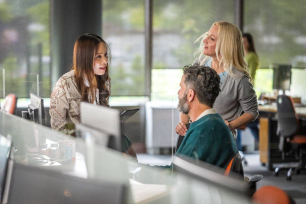 istock Diverse Team Engages in Discussion at Office 2178618323