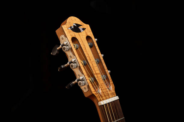 istock A handmade classical guitar crafted with nylon strings, showcasing the skill and artistry of a traditional luthier with a Magpie Inlay on the headstock 2178618691