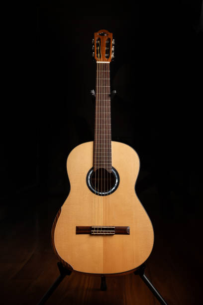 istock A handmade classical guitar crafted with nylon strings, showcasing the skill and artistry of a traditional luthier 2178618694