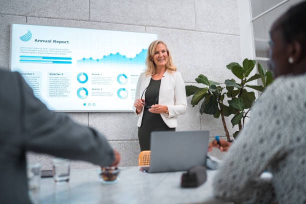 istock Mature Businesswoman's Expert Presentation in a Modern Boardroom 2178619479