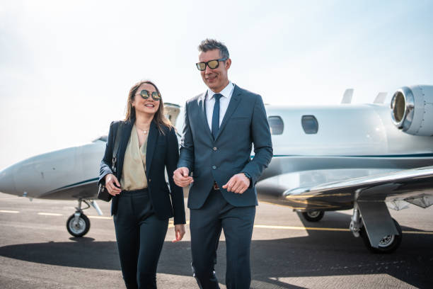istock Asian Business Leaders Alighting from Jet 2178619699