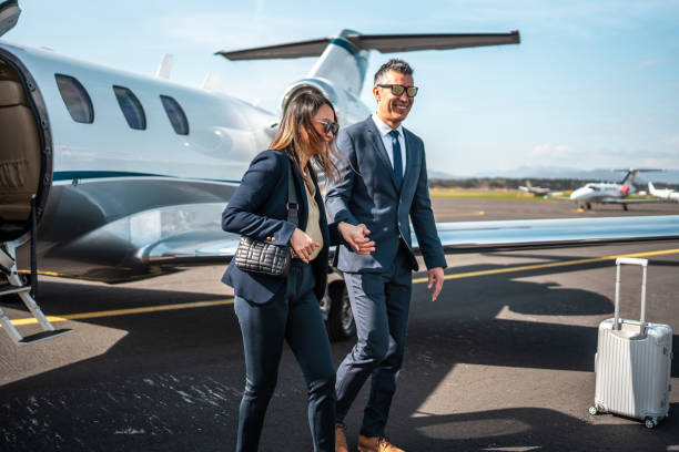 istock Asian Business Leaders Alight from Jet 2178619709