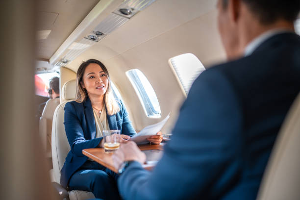 istock Asian Business Leaders in Private Jet Conversation 2178619714